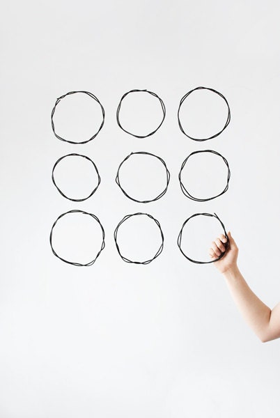 fine art photography print by Sanne Griekspoor (hand, circles, geometry)