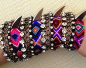 Hai- 1" wide hand-woven, friendship bracelet embellished with gunmetal crystal chain embellishment and shark claw spikes