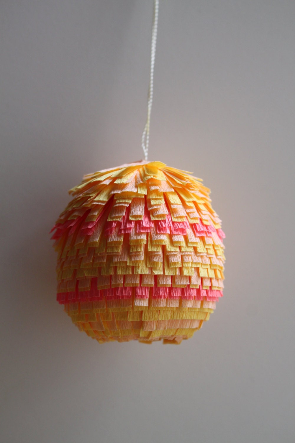 yellow and pink mini egg piñata