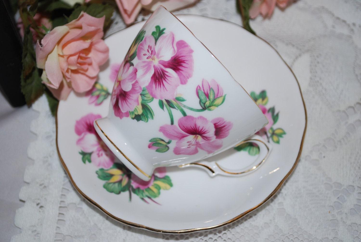 ROYAL VALE  Vintage Tea cup and saucer. Bone China from England, pink flowers