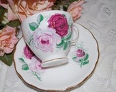 ROYAL VALE  Vintage Tea cup and saucer. Bone China from England, pink and dusty rose flowers