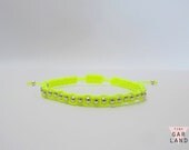 Macrame beaded bracelet in silver and neon yellow