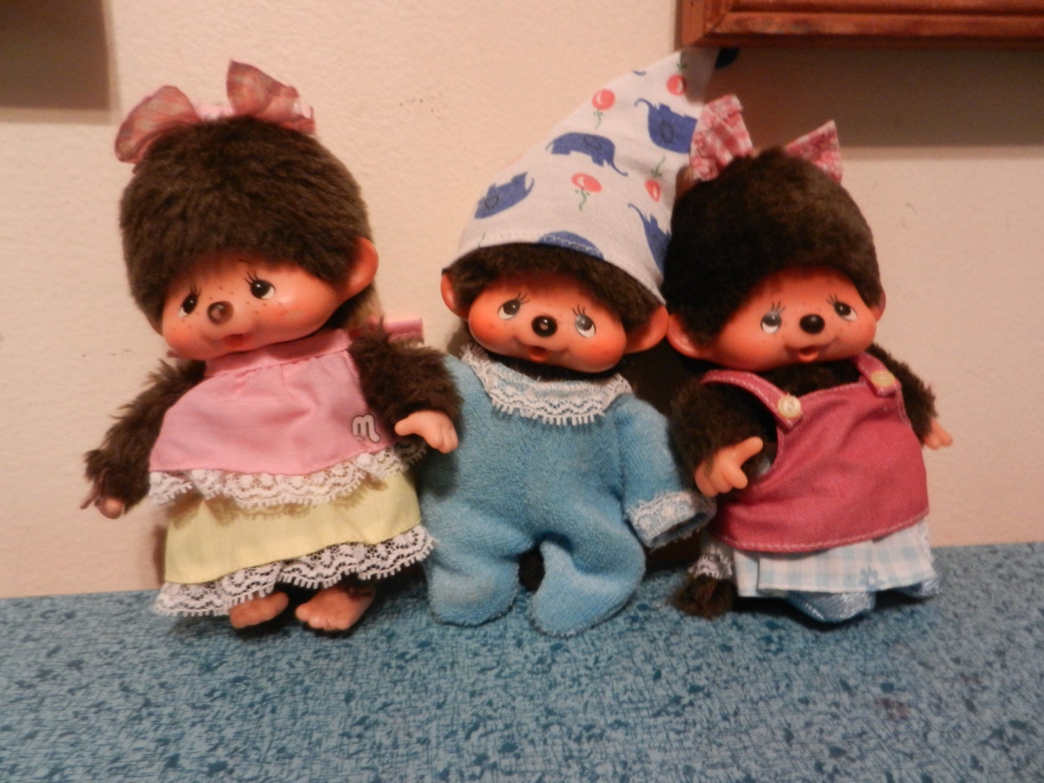 Vintage 1974 Japanese Monchhichi Trio with Original Outfits