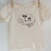 Organic Baby Tee featuring Smart Puppy Terrier inside Brain
