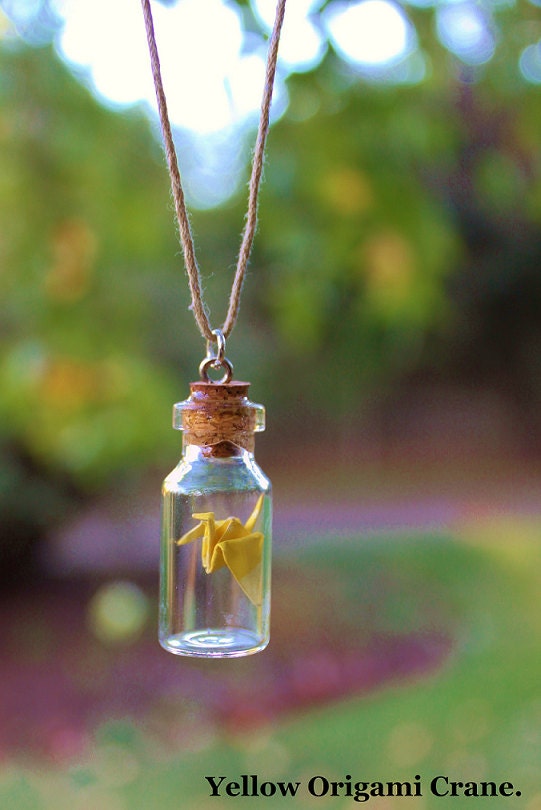 Origami Paper Cranes inside Glass Vials. (Yellow Origami Crane)