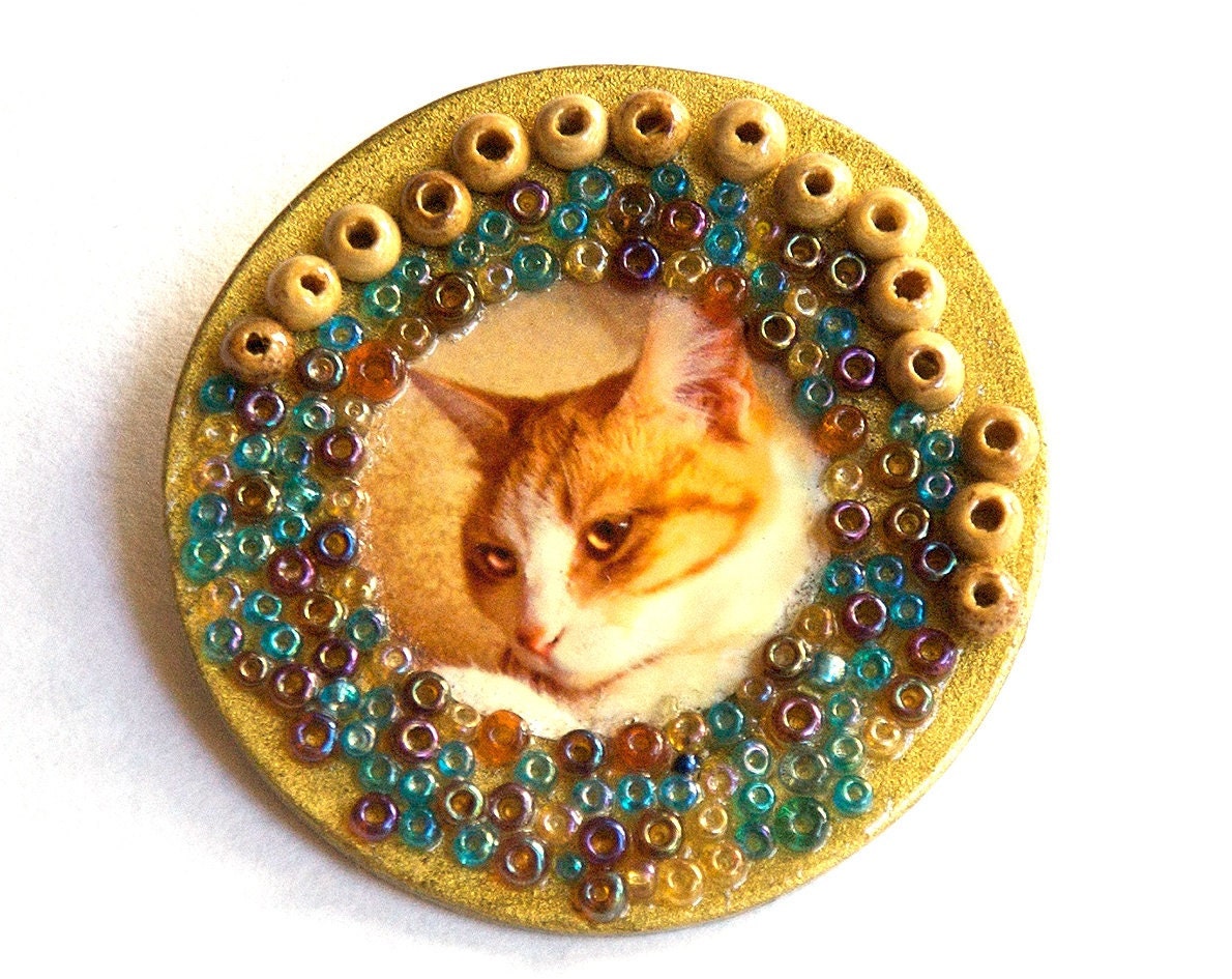 Cat brooch. Orange and blue.  Mixed media brooch.