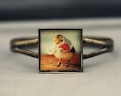 Antique Brass Square Photo Bracelet of A Chick Wearing A Vintage Kerchief