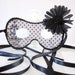 Retro Black and White Polka Dot Mask with Skull and Crossbones and a Large Flower Accent Costume