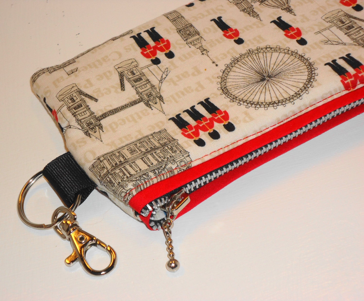 Medium Padded Zippered Clutch London Calling -- White w/Swivel Key Clip