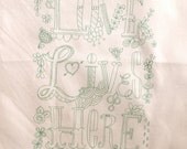 Love Lives,medium size seafoam embroidery pattern on fabric