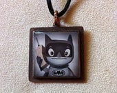 Handcrafted Art Pendant: Batman making an important call on his brick phone