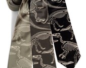Dinosaur tie. Dinosaur skeleton men's necktie. Warm cream print. Vegan safe microfiber. Your choice of color and width.