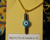 Light blue evil eye with Hematite on gold tone snake necklace