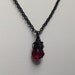 The Sin-Eater, Rehv's necklace