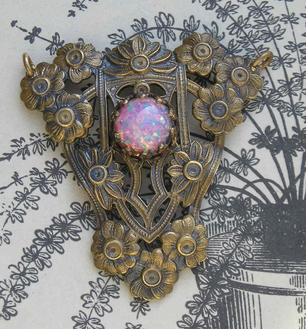 Lovely vintage brass Sucessionist style cut work necklace centerpiece for a special cabochon..