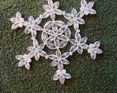 New Snowflake Ornament design for 2013 "Poinsettia flower Snowflake" done in paper with the technique known as Quilling