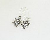 Silver turtle dangle earrings