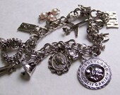 SJK Vintage -- Sterling Silver Airflex Charm Bracelet with Twelve Sterling Charms -- Mom's Bracelet (1960's-70's)