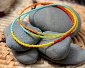 one layer . a soul mantra seed bead necklace