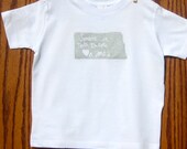 Someone in North Dakota hearts Me Kids T shirt