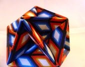 Bright Blue and orange origami polyhedron- folded paper