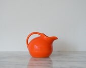vintage orange ball shaped creamer mini pitcher