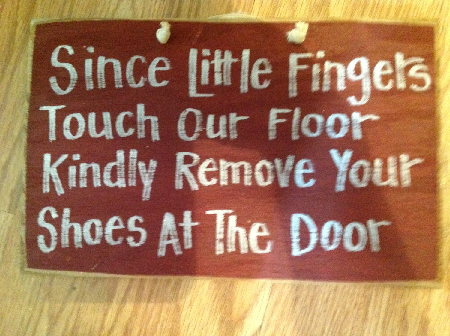 Little fingers touch floor Remove shoes sign