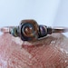 Aritsan glass lampwork copper cuff bracelet ...Recoil ... reactive glass lampwork focal bead bracelet  by simply cindy