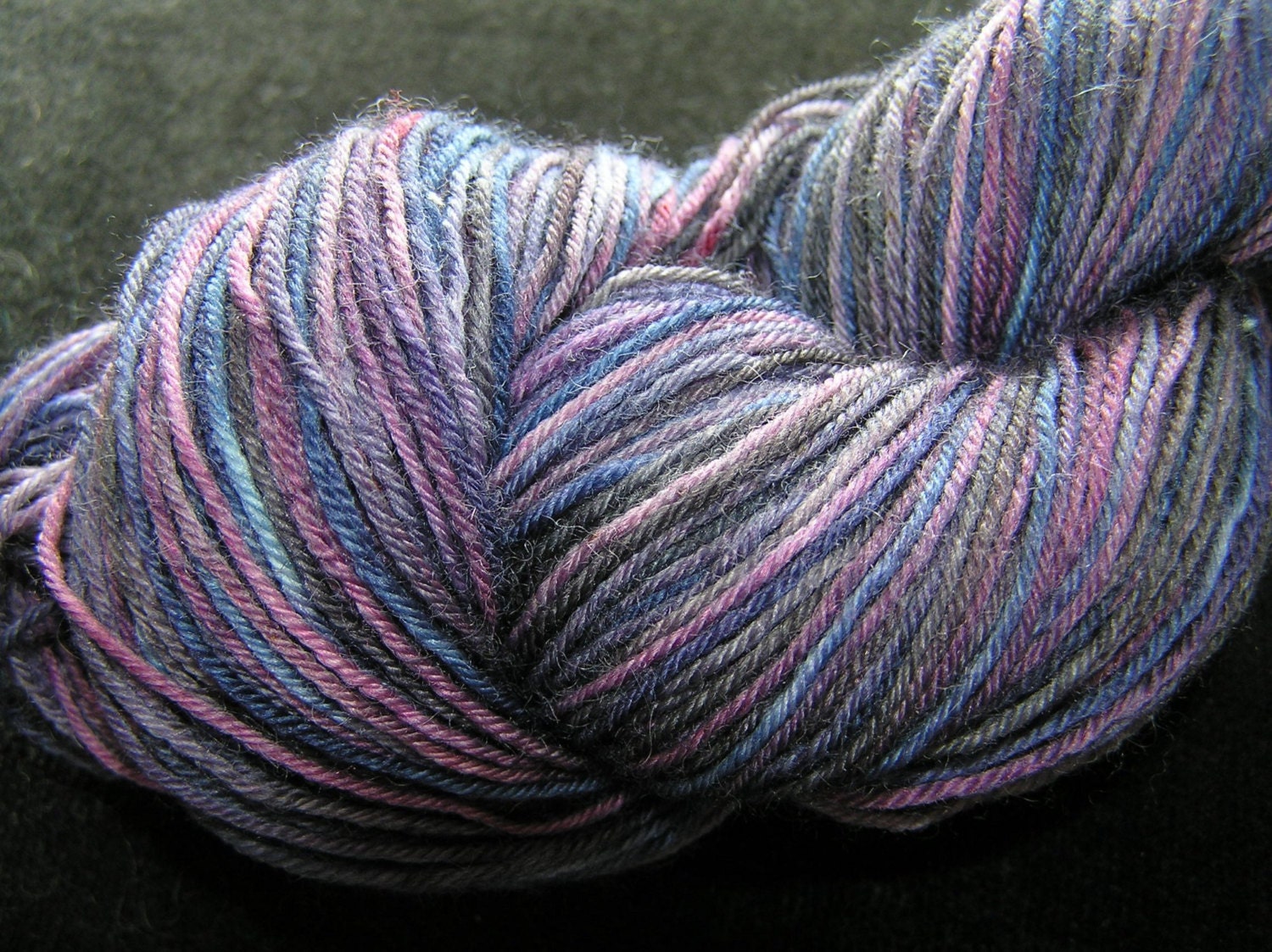 100g superwash sock yarn with nylon, purples, blues,greys