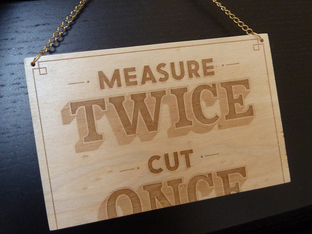 Measure Twice Cut Once sign