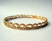 Vintage Lace bangle bracelet cast in bronze with 14k gold plate