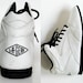 vintage LA GEAR ankle lace ups /  1980s mod white DUCKY leatherette hi top shoes