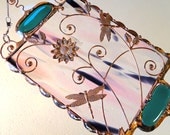 Dragonflies and Wire Composition.on glass