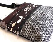 Patchwork zipper bag in black brown.