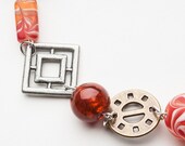 SOLD...chunky red and orange statement necklace and brown jersey tie