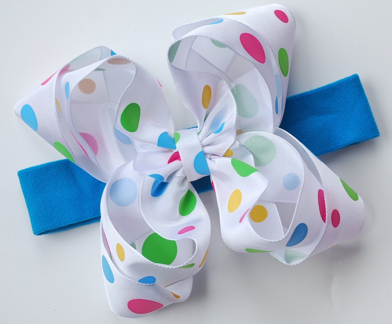 boutique double layered BIG COLORFUL DOTS hair bow on a headband