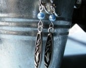 Abstract dolphin and pearl earrings