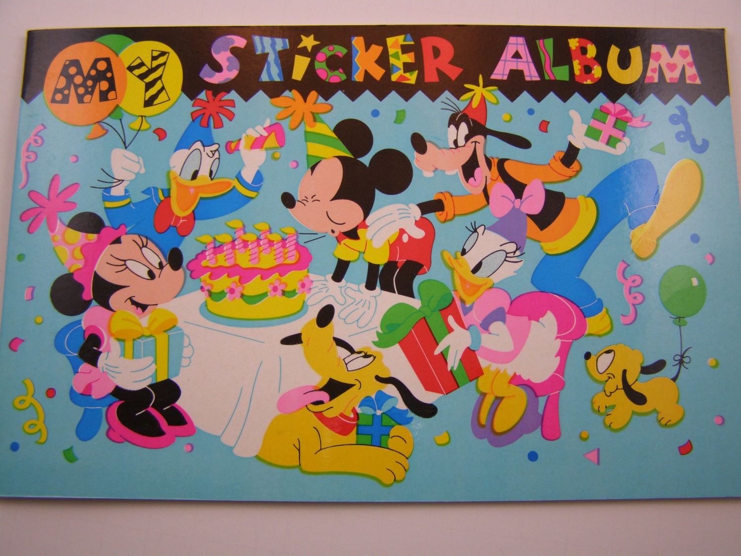 Sandylion Sticker album with Disney classic characters design