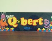 vintage Qbert arcade game marquee
