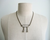 Modern Brass Abstraction Necklace.
