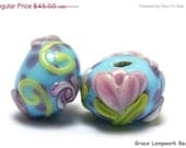 ON SALE 40% OFF Handmade Glass Lampwork Bead Set - 11605101- Rondelle-Seven Blue w/Pink Flower  Beads