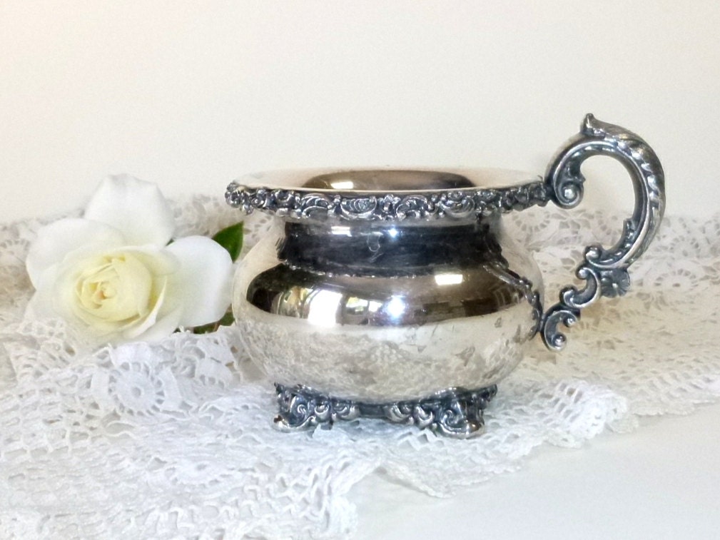 vintage silverplate cream or sugar, or little vase