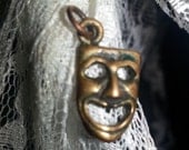 Tiny Laugh Now Cry Later Drama Mask Pendant