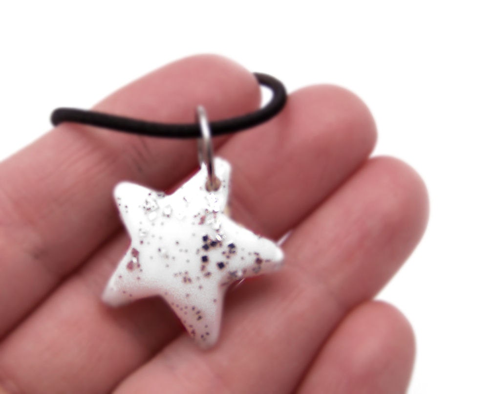White & Silver Star Resin Glitter Pendant on Black Stretch Cord Necklace