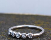 Faceted 5 stone ring palladium and diamonds