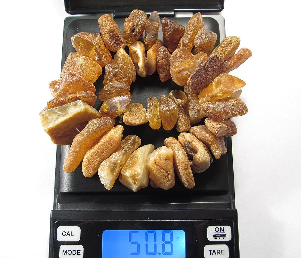 Baltic amber beads (50.8 gram, 40 beads). ED137