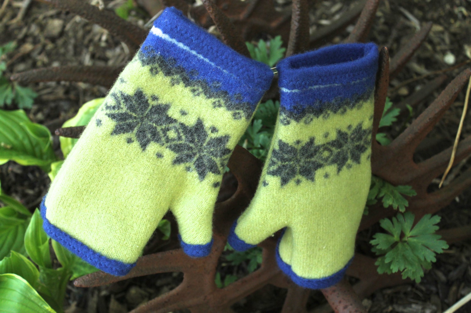 Recycled cashmere and wool fingerless gloves. Iconic Fair Isle pattern in apple green, charcoal, cobalt blue, and ivory.  Cobalt lining.