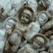 One Stunning Antique German Frozen doll with Easter Bonnets