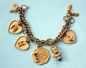 Vintage Gold Tone Charm Bracelet 1960s John F. Kennedy Bust and Baby Shoes