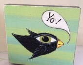 Little flying bird print on wood block